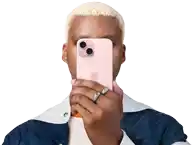 Person holding iPhone 15 in front of his face to conceal indentity